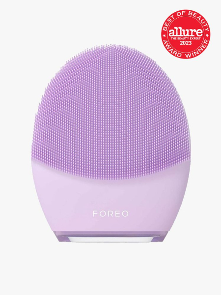 Foreo Luna 4: A lavender-colored facial cleansing brush on a light gray background with an Allure Best of Beauty 2023 seal on the upper right corner.