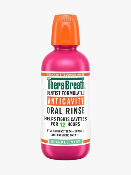 TheraBreath Anticavity Fluoride Mouthwash in branded bottle component on a light gray background