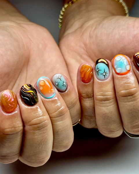 taylor swift tloas nails  orange and blue nail art