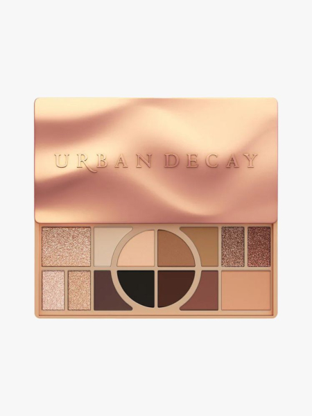 Urban Decay Naked Shaped WarmToned Makeup Palette for Eyes  Face in branded component on a light gray background